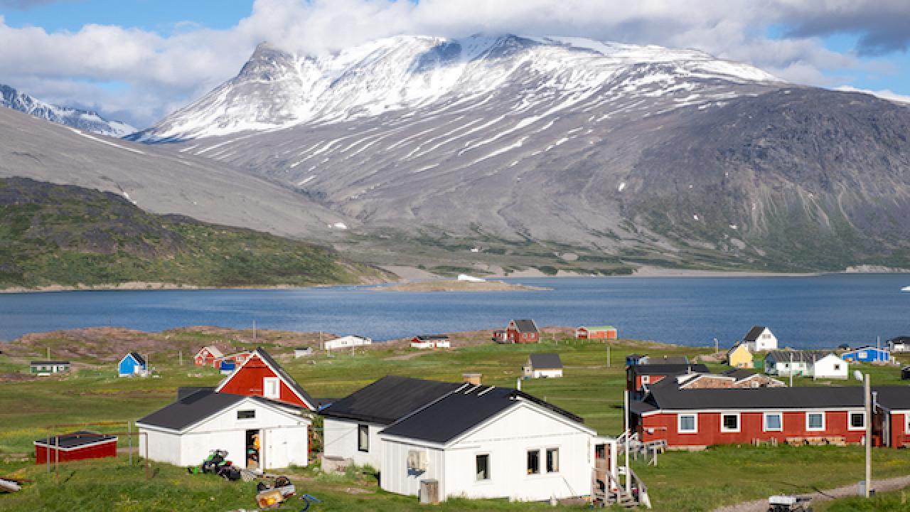 View of Igaliku in southern Greenland. A settlement with just a few dozen inhabitants. Famous for its Norse ruins of Gar√É¬∞ar and its unique farming sites at the edge of the ice cap.