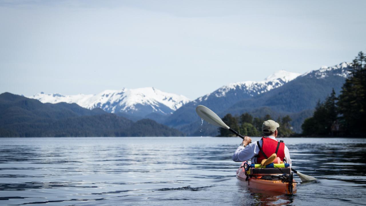 Adult Male Kayaking in Sitka Harbor Alaska