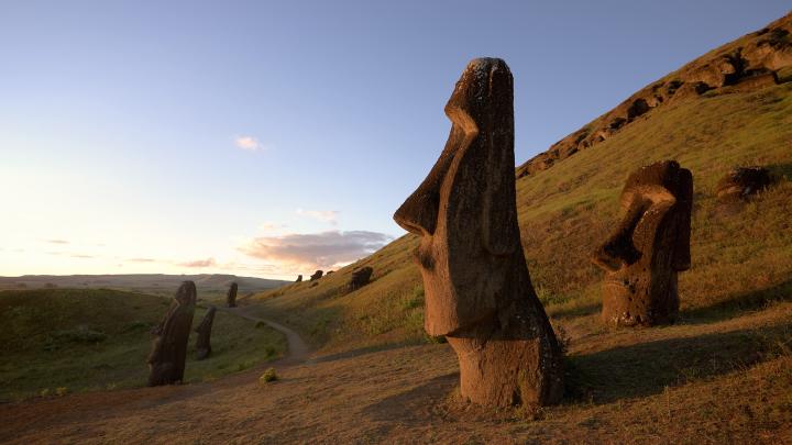 Chile, Easter Island, Moai statues of Rano Raraku at dusk