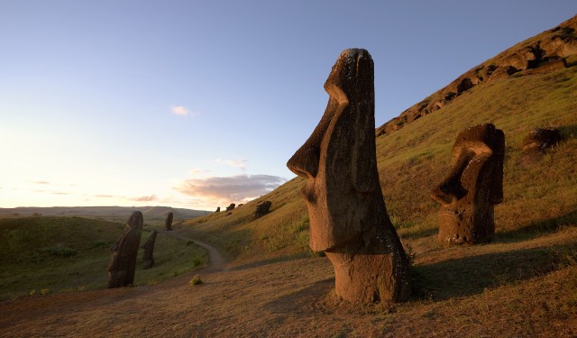 Chile, Easter Island, Moai statues of Rano Raraku at dusk