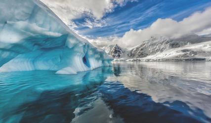 Iceberg floats in Andord Bay on Graham Land, Antarctica.